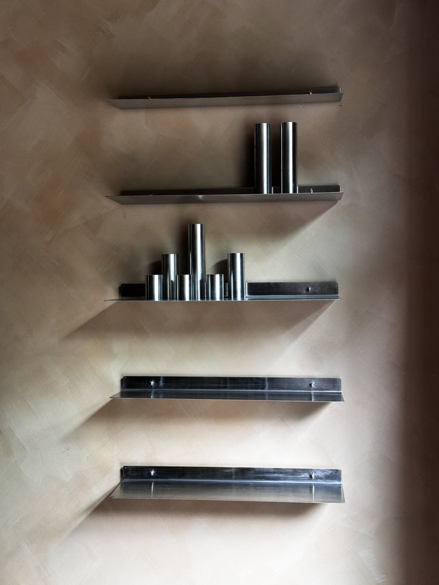 Bent stainless steel wall shelf modular form eisen